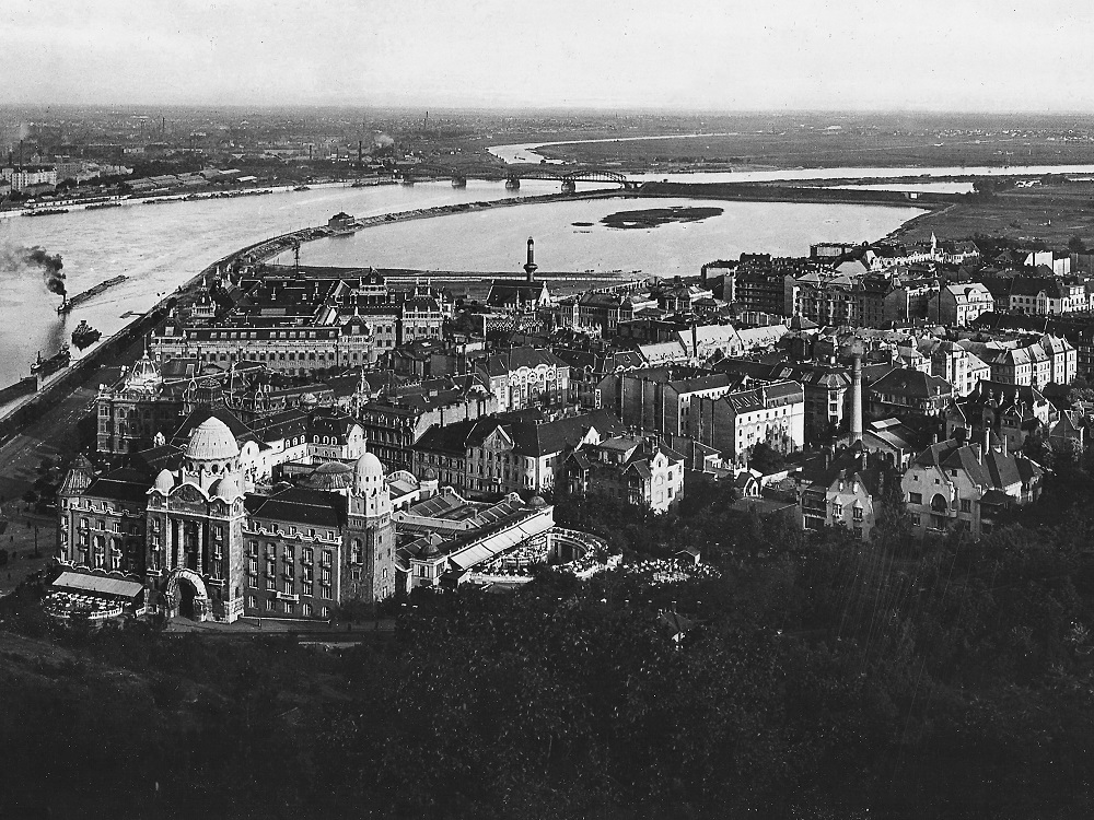 View from Gellért Hill to the south in 1926: the Gellérthotel and thermal bath in the foreground, Lake Lágymányos in the centre of the picture and the bay behind it, where MOL Campus stands today.